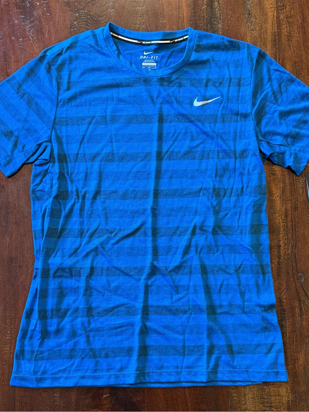Nike Running Dri-Fit blue striped shirt - Men’s M